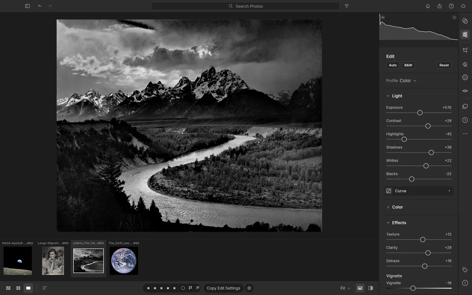Official LightCraft capture showing a photo open beside development controls and a filmstrip.
